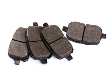 Set of brake pads, car spares isolated on white background