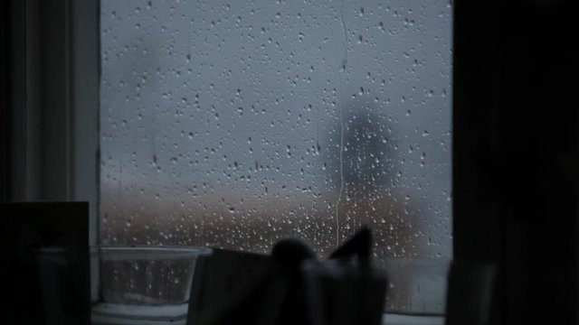Rain water on Window- window - rain - close up - droplets - glass - weather - storm