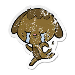 distressed sticker of a cartoon dog crying
