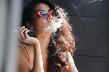 Naklejka premium Cigarette smoking is dangerous to health.