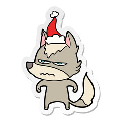 sticker cartoon of a annoyed wolf wearing santa hat