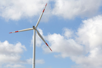 wind turbine in cloud sky