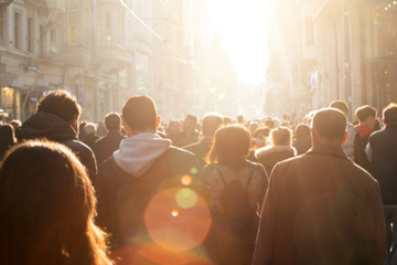 Blurred crowd of unrecognizable at the street