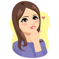 Young brunette woman licking finger after eating delicious dessert