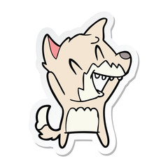 sticker of a laughing fox cartoon