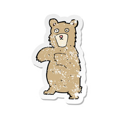 retro distressed sticker of a cartoon bear
