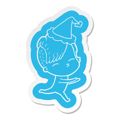 cartoon  sticker of a girl in onesie wearing santa hat