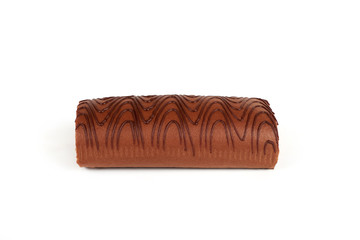Chocolate biscuit roll cake isolated on white background.