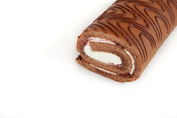 Chocolate biscuit roll cake isolated on white background.