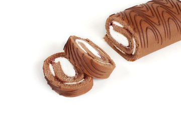 Biscuit roll cut into pieces, on a white background.