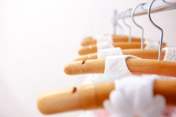 White dresses hung on hangers