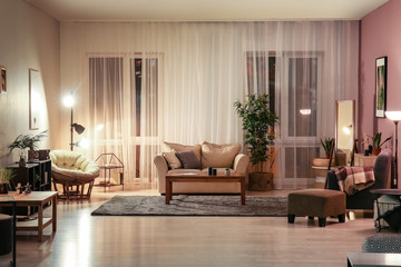 Interior of modern apartment in evening