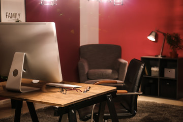 Interior of modern room with comfortable workplace