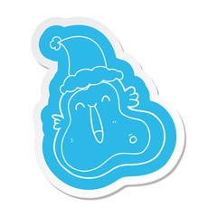 cartoon  sticker of a germ wearing santa hat