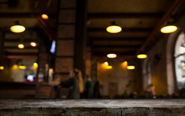 Beer barrel with beer glasses on a wooden table. The dark brown background.