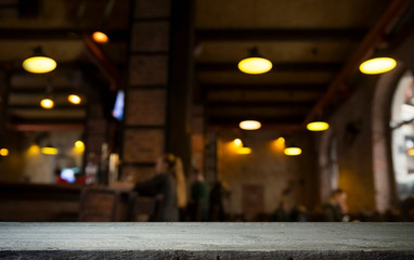 Beer barrel with beer glasses on a wooden table. The dark brown background.