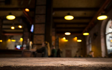 Beer barrel with beer glasses on a wooden table. The dark brown background.