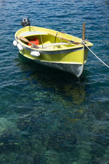 Italy, Cinque Terre, Manarola, a small boat in a body of water