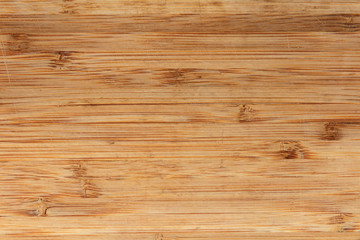 Kitchen chopping board. Dark wood texture with scratches
