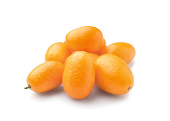 Tasty kumquat fruit on white background