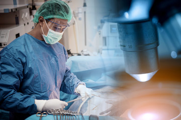 Scientist or doctor working in the operating room with microscope and glassware, medical and science research and development concept