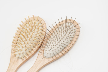 Pair of two hair brushes made from wood. On white background. Natural eco friendly combs.