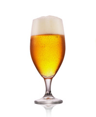 Cold Craft light Beer in a glass with water drops. Glass of beer isolated on white background
