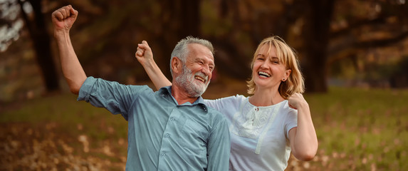 Lifestyle senior couple happy and relaxed . Good Healthy elderly in park nature. Group of Senior...