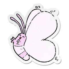 distressed sticker of a funny cartoon butterfly