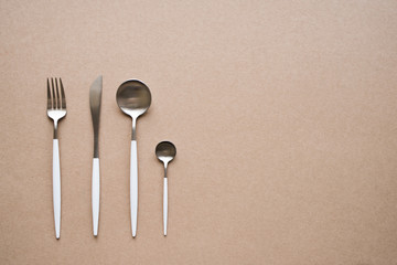 white and chrome cutlery