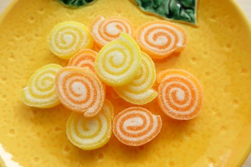 jelly candy on yellow plate.