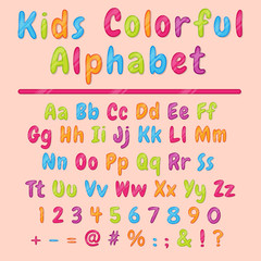 Colorful latin cartoon alphabet and figures. Font design for kids.