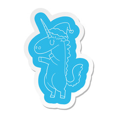 cartoon  sticker of a unicorn wearing santa hat