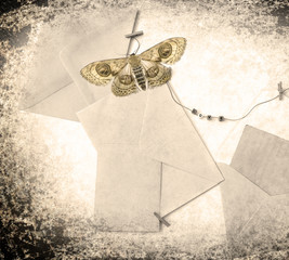 Post envelopes and vintage blank cards. Word love made of a plastic letters. All objects are...