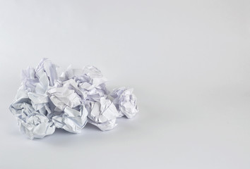 Crumpled papers on white
