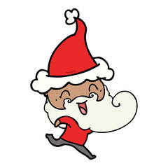happy bearded man wearing santa hat
