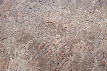 Close up of abstract brown stone texture with high resolution. For background, textures, product designs, albums, cards and invitations, catalogs. For package ae up of abstract brown stone texture