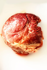 piece of fresh pork meat on a white background