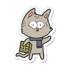 sticker of a cartoon cat holding christmas present