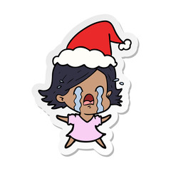 sticker cartoon of a woman crying wearing santa hat