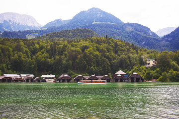 Fototapeta na wymiar Wooden dock for boats on Konigssee Lake, Austria