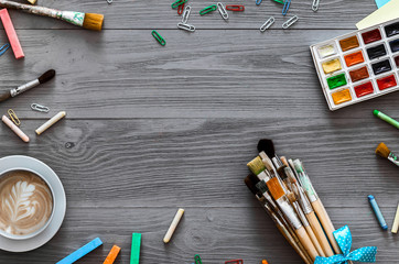Artistic background concept, creative art work accessory colorful supplies set, paint brushes,...