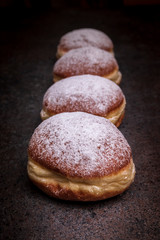 Jam-filled and sugar-dusted donuts