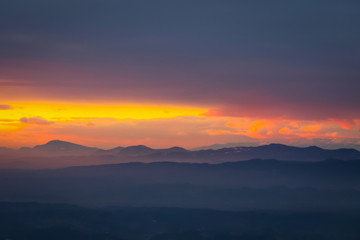 Fototapeta na wymiar Sunset over hills in countryside