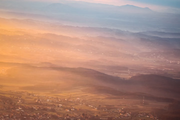 Sunset over hills in countryside