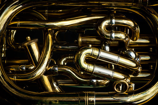 Detail of the brass pipes of a tuba
