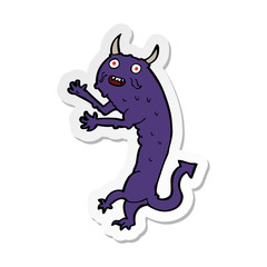 sticker of a cartoon devil