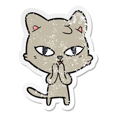 distressed sticker of a cartoon cat