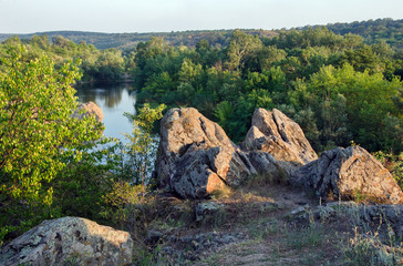 View of  rocks by  river