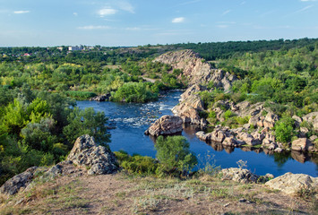 Obraz premium River with rocks in reserve